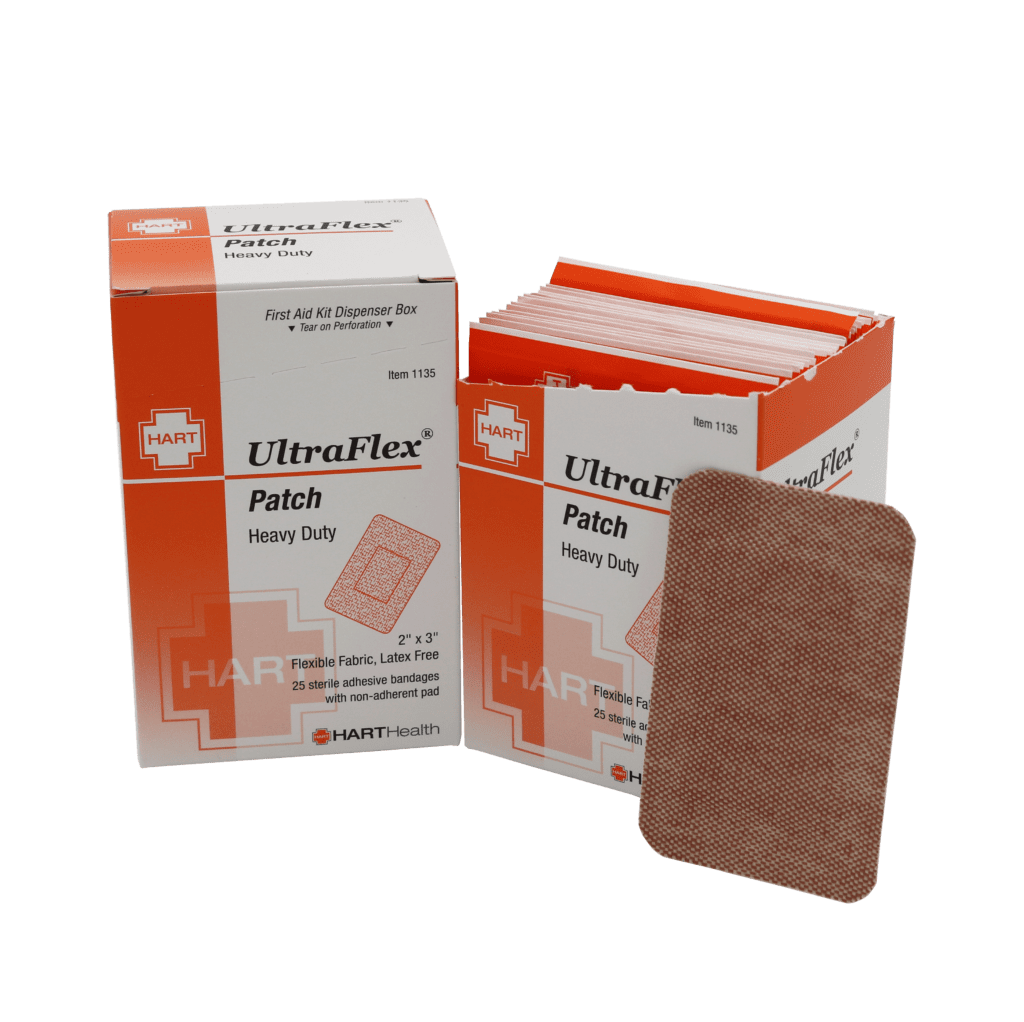 Ultraflex heavy duty patch bandage in workplace dispenser box.