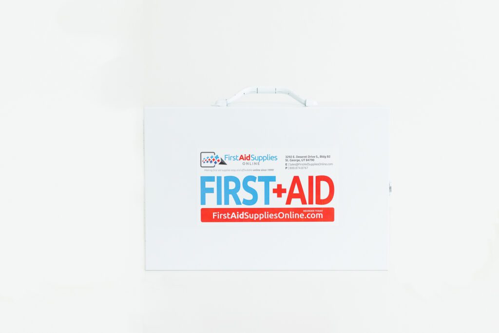 Small 2 shelf industrial first aid cabinet - front