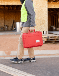 Construction worker carrying Class B rugged first aid kit